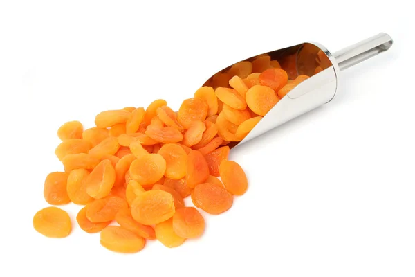 Dried apricots and metal scoop Stock Image