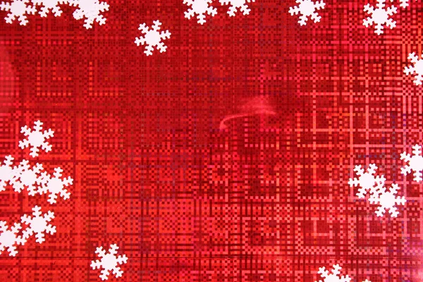 Fondo rojo de Navidad con copos de nieve — Foto de Stock