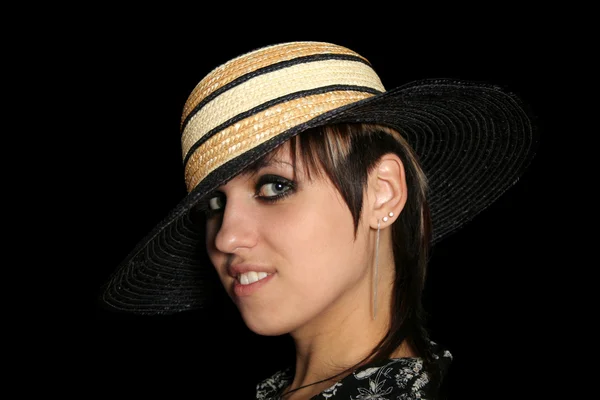 The young smiling girl in a straw hat — Stock Photo, Image