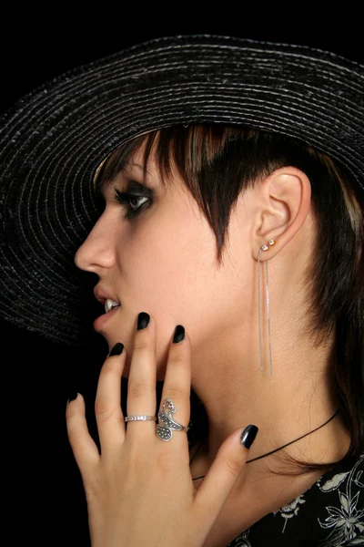 The young beautiful girl in a straw hat — Stock Photo, Image