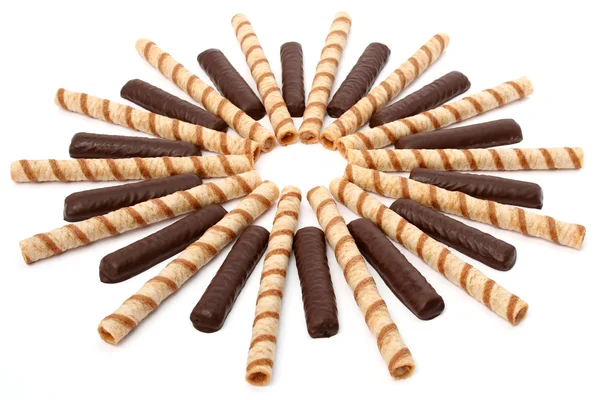 Vanilla and chocolate sticks with a cream, isolated — Stock Photo, Image