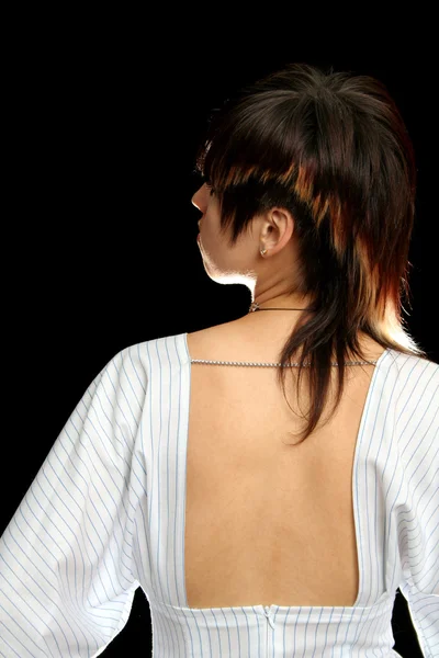 Den unga kvinnan med öppen rygg — Stockfoto
