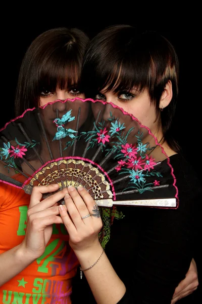Girls with a spanish fan Royalty Free Stock Photos