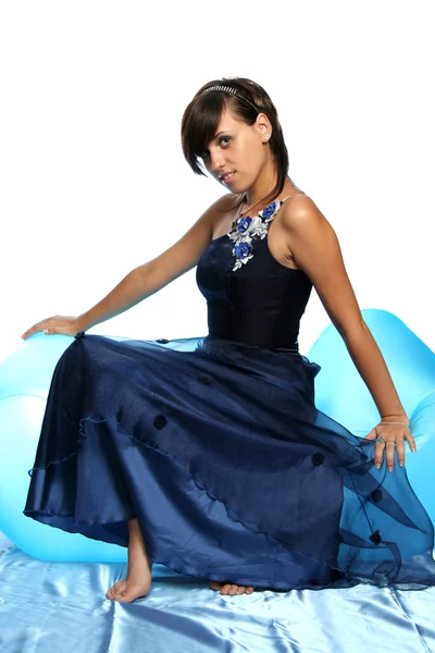 Girl in an blue evening dress — Stockfoto