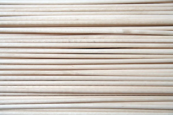 Hintergrund aus Holzstäben — Stockfoto