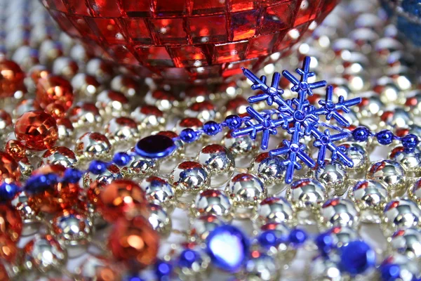 Mirror New Year\'s sphere and blue snowflake