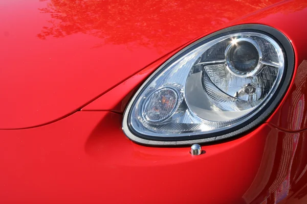 Headlight and cowl of the chic car — Stock Photo, Image