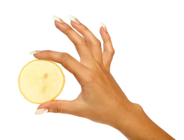 Manicure e laranja fatiada — Fotografia de Stock