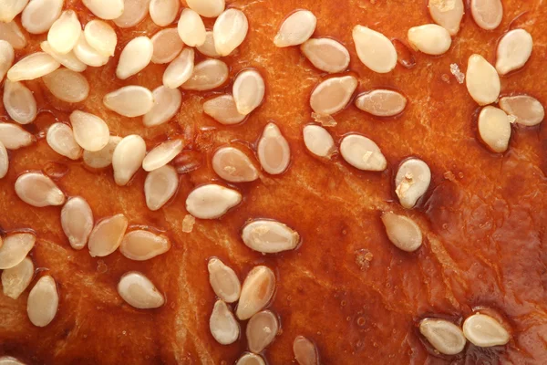 Sesame seeds on bread's crust — Stock Photo, Image