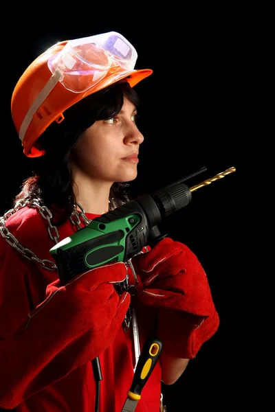 Young woman with drill — Stock Photo, Image