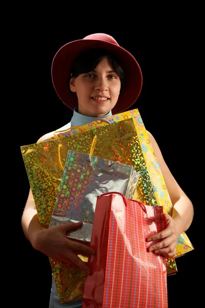 Mujer joven con bolsas de compras — Foto de Stock