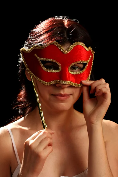 Young brunette with venetian red mask — Stock Photo, Image