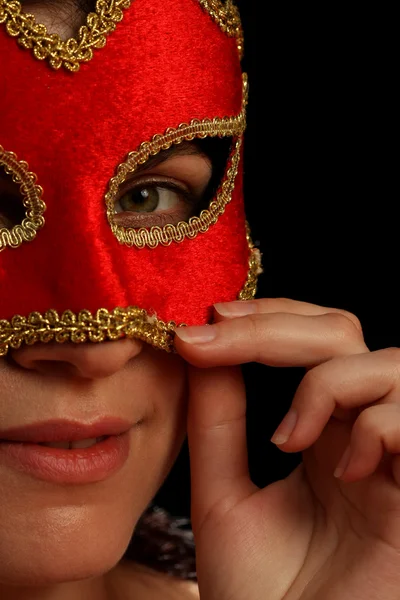 Young brunette with venetian red mask — Stock Photo, Image