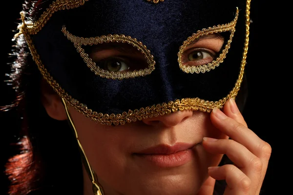 Young brunette with venetian mask — Stock Photo, Image