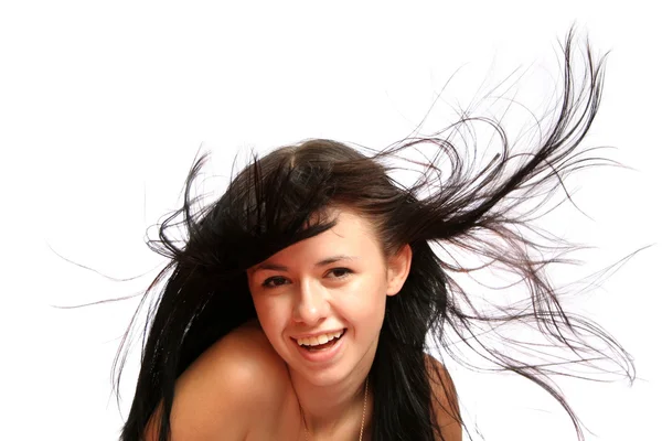 Brunette girl with long windy hair — Stock Photo, Image