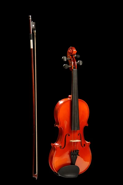 Geige mit Schleife auf schwarz — Stockfoto