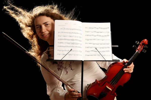 Girl violinist and pult — Stock Photo, Image