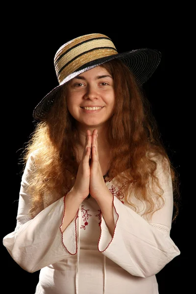 Young brunette girl and straw hat — Stock Photo, Image