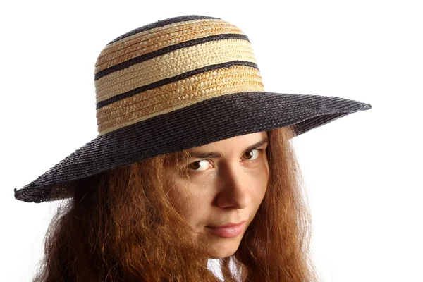 Young brunette girl and straw hat — Stock Photo, Image