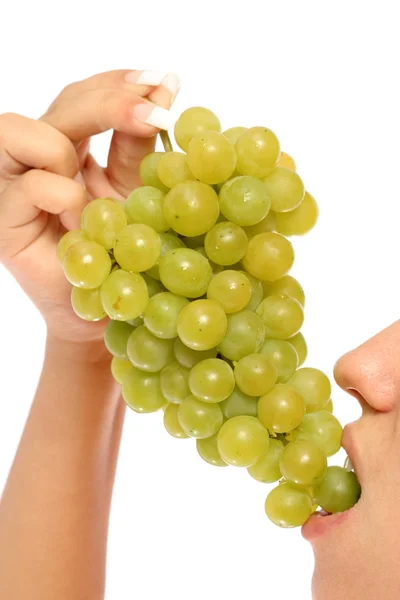 Girl with a cluster of green grapes — Stock Photo, Image