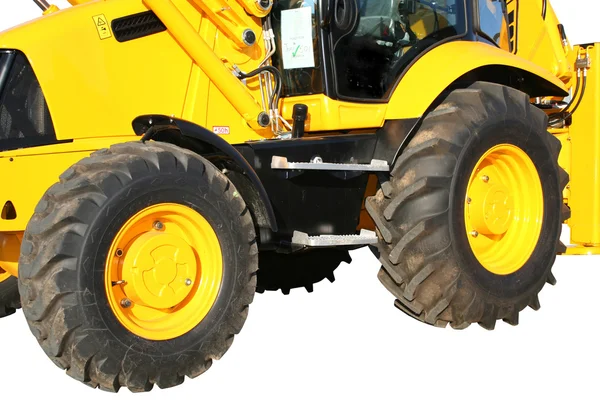 Two wheels of a building tractor — Stock Photo, Image