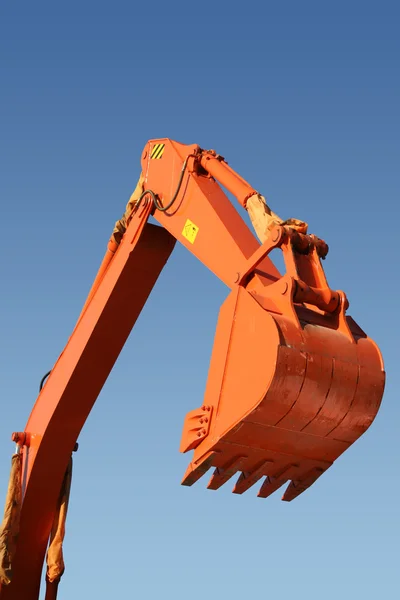 Hand and shovel bucket — Stock Photo, Image