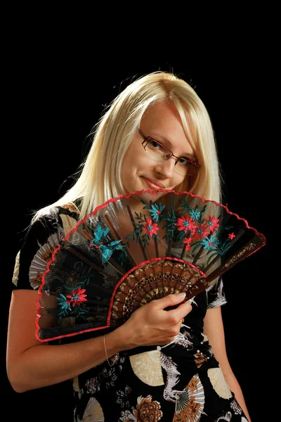 A young attractive woman with fan — Stock Photo, Image