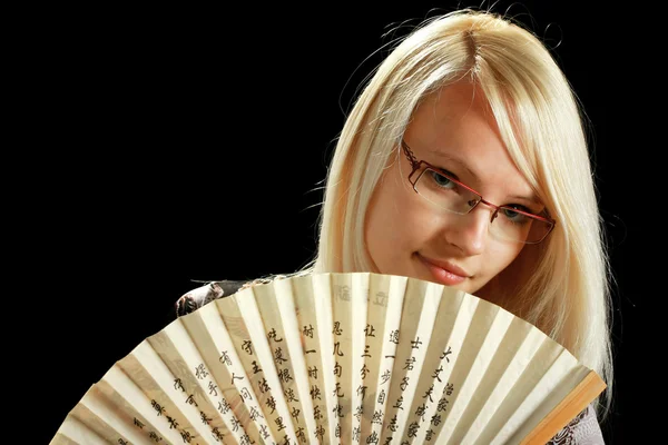 A young attractive woman with fan — Stock Photo, Image