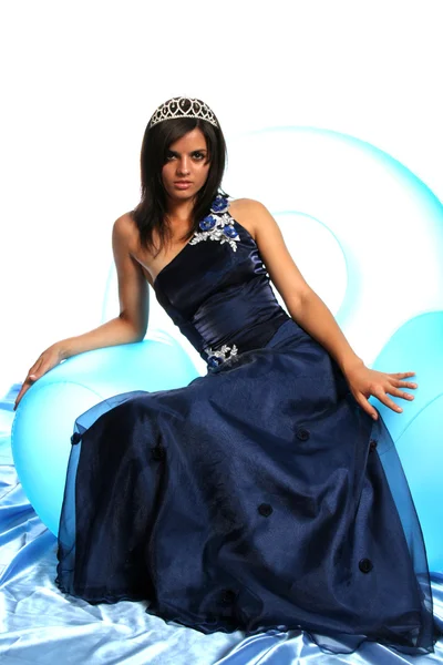 Girl in an blue evening dress and with a diadem — Stockfoto