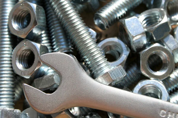 Wrench, nuts and bolts — Stock Photo, Image