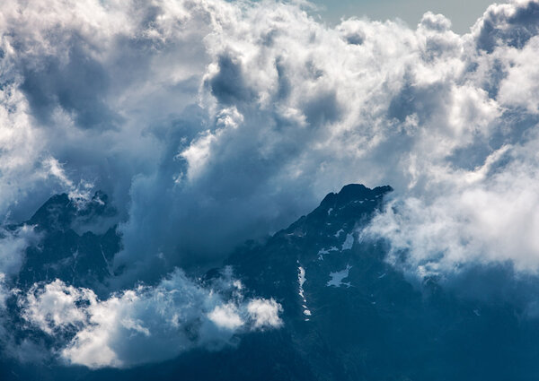 Clouds over the Mountains Peaks