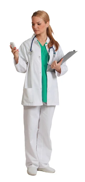 Yound Woman Doctor Reading a Phone Message — Stock Photo, Image