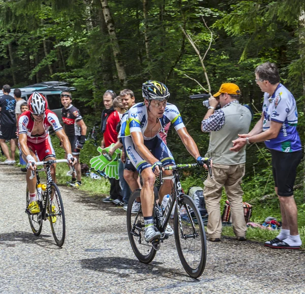 Fietsers klimmen — Stockfoto