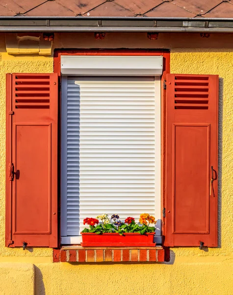 Window with wooden blinds of a rural house in Brou, a small town located in Eure et Loir Department in Central France. This image is part of my project 