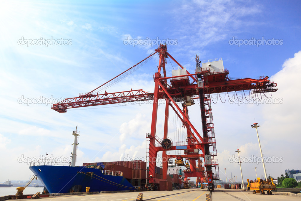 Moored container ship and cranes in a harbor