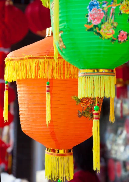 Colorful Chinese paper lanterns hanging in a street martket — Stock Photo, Image