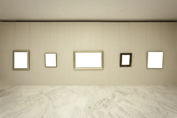 Empty frames on wall — Stock Photo, Image