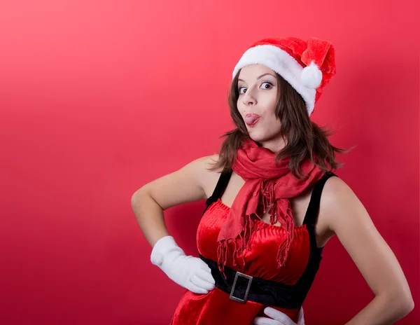 Schöne sexy Mädchen trägt Weihnachtsmann-Klamotten — Stockfoto