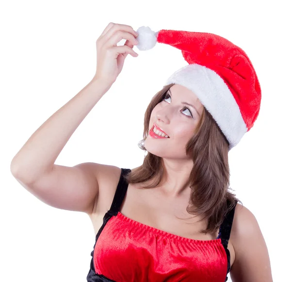 Sonriente hermosa chica con Santa sombrero tocando la cara de la mejilla con su mano aislada sobre fondo blanco Imagen De Stock