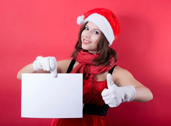 Christmas girl in santa hat holding banner. Isolated. — Stock Photo, Image