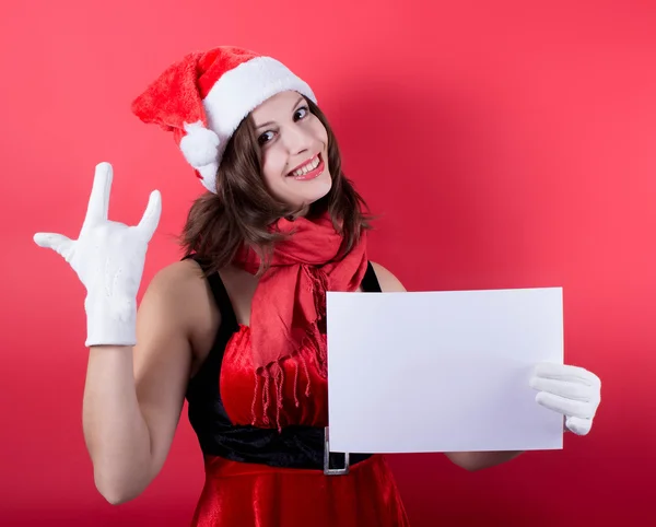 Christmas girl in santa hat holding banner. Isolated. — Stock Photo, Image