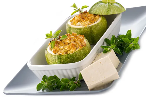 Zucchinis stuffed with tofu cheese, vegetarian food — Stock Photo, Image