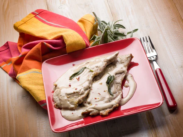 Escalope with cream sauce — Stock Photo, Image