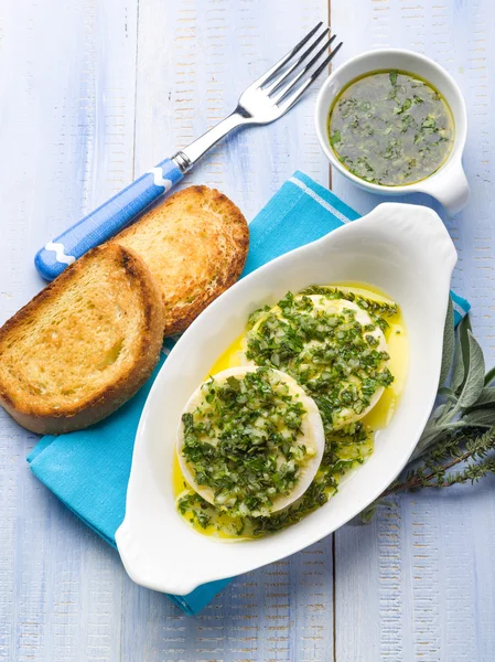 Marinated tomino cheese with herbs — Stock Photo, Image