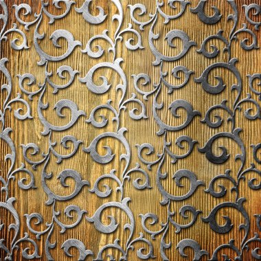 eski ahşap zemin üzerinde metal süs