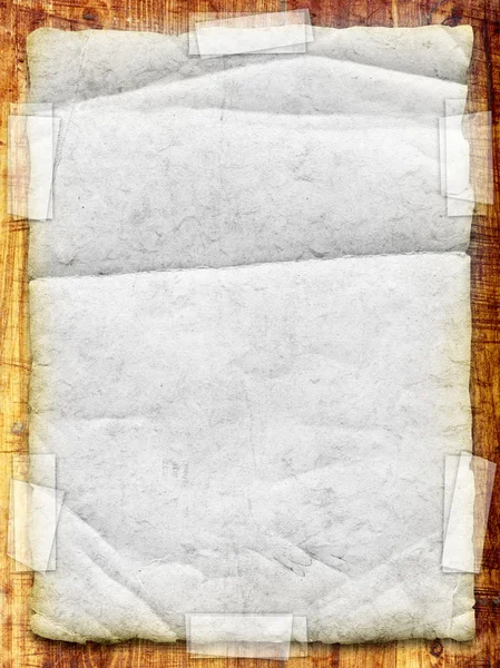 Stará hůl list papíru na dřevěné stěně obrazce — Stock fotografie