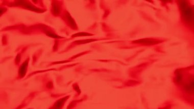 Kırmızı Kumaş yavaşça soldan sağa kayıyor Kara Arkaplanda rüzgarla