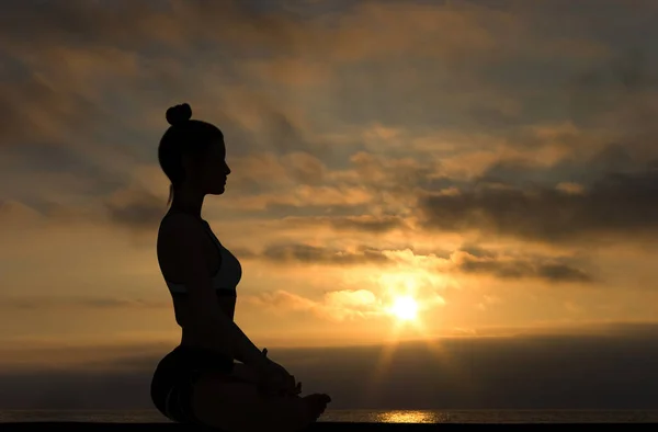 Woman Side Silhouette Yoga Easy Meditating Pose Sunset Cloudy Sky — Stockfoto