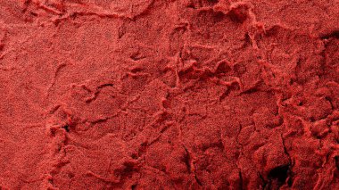 Milyonlarca Tiny Red Partikülü Siyah zemin üzerinde birçok küçük dalgalarla ekranı dolduruyor.