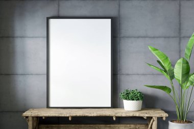 Gri beton duvarda boş çerçeve modeli.